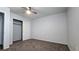 Bedroom featuring a ceiling fan, neutral walls, carpet, and closet at 2325 Windmill Pkwy # 1313, Henderson, NV 89074