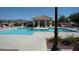Inviting community pool with a gazebo and lounge chairs, providing a relaxing and enjoyable outdoor space at 2325 Windmill Pkwy # 1313, Henderson, NV 89074