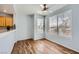 Bright dining area with wood floors, natural light, offering a comfortable space for meals and relaxation at 2325 Windmill Pkwy # 1313, Henderson, NV 89074