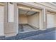 A one-car garage with door open providing a view of the empty interior, ready for parking or storage at 2325 Windmill Pkwy # 1313, Henderson, NV 89074