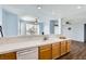 Bright kitchen featuring a double sink and white countertop with a view to the living room at 2325 Windmill Pkwy # 1313, Henderson, NV 89074