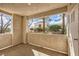 Cozy covered patio with a view of well-maintained landscaping and blue skies, perfect for outdoor relaxation at 2325 Windmill Pkwy # 1313, Henderson, NV 89074