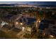 Night aerial view showcases home with solar panels in a Las Vegas neighborhood at 2528 Furnace Creek Ave, Henderson, NV 89074