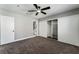 Bedroom featuring carpet, closet, ceiling fan, and gray colored walls at 2549 Pine Creek Rd, Las Vegas, NV 89115