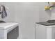 Convenient laundry area equipped with a modern washer and dryer set, maximizing space and functionality at 2900 Sunridge Heights Pkwy # 1916, Henderson, NV 89052