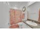 Full bathroom featuring a vanity and a shower with decorative curtain at 3018 Carothers Ct, North Las Vegas, NV 89032
