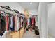 A well-organized walk-in closet with rods and shelves, and convenient storage at 3018 Carothers Ct, North Las Vegas, NV 89032