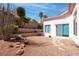 Backyard featuring desert landscaping, and a glimpse of the house at 3025 Treesdale Dr, Las Vegas, NV 89134