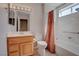 A bathroom with a vanity, toilet, and shower/tub combination at 3025 Treesdale Dr, Las Vegas, NV 89134