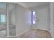 Welcoming entryway with tile floors, a decorative window, and a white front door at 3025 Treesdale Dr, Las Vegas, NV 89134