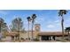 Community fitness center in a desert environment with palm trees and bright blue sky at 3025 Treesdale Dr, Las Vegas, NV 89134