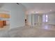 Open-concept living room with carpet flooring at 3025 Treesdale Dr, Las Vegas, NV 89134