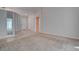 Cozy living room with carpet flooring and natural light at 3025 Treesdale Dr, Las Vegas, NV 89134