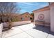 Charming patio features decorative outdoor elements, complemented by the surrounding neighborhood at 3025 Treesdale Dr, Las Vegas, NV 89134