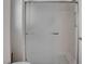 Enclosed shower featuring a glass door, a shower head, and tile accents at 3025 Treesdale Dr, Las Vegas, NV 89134