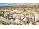 Expansive aerial view showcasing the desert community, golf course, and the home's prime location at 3163 Elk Clover St, Las Vegas, NV 89135