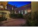 Private courtyard featuring brick pavers, mature shrubs, and access to the residence at 3163 Elk Clover St, Las Vegas, NV 89135