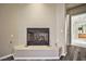 Modern fireplace in a light-colored room, with tile floor partially visible at 3163 Elk Clover St, Las Vegas, NV 89135