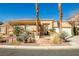 Charming single-story home featuring a beautiful desert landscape, tiled roof, and a welcoming entrance at 3163 Elk Clover St, Las Vegas, NV 89135