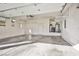 Spacious three car garage with finished walls and ceiling and hanging storage at 3163 Elk Clover St, Las Vegas, NV 89135