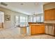 Bright kitchen featuring granite countertops, tiled flooring, and stainless steel appliances at 3163 Elk Clover St, Las Vegas, NV 89135