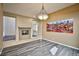 Comfortable living room featuring a fireplace and seamless flooring transition at 3163 Elk Clover St, Las Vegas, NV 89135