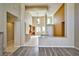 Open-concept living room boasts high ceilings, natural light, and seamless flow to kitchen at 3163 Elk Clover St, Las Vegas, NV 89135