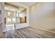 Expansive living area with high ceilings, hardwood floors, and open flow to the kitchen at 3163 Elk Clover St, Las Vegas, NV 89135