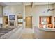 Open living area with high ceilings, fireplace, and open layout to other areas at 3163 Elk Clover St, Las Vegas, NV 89135