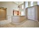 Spacious living room featuring high ceilings and an open floor plan to the kitchen at 3163 Elk Clover St, Las Vegas, NV 89135