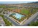 Aerial view featuring baseball field and pool, highlighting the community's recreational amenities at 3167 Biccari Ave, Henderson, NV 89044
