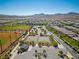Aerial view of community baseball and basketball fields, pools, and lush landscaping at 3167 Biccari Ave, Henderson, NV 89044