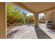 Private back patio with pavers, perfect for outdoor dining and relaxation, with lush landscaping at 3167 Biccari Ave, Henderson, NV 89044