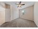 Bedroom with plush carpet, ceiling fan, and a window with blinds at 3167 Biccari Ave, Henderson, NV 89044