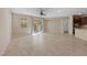 Bright living room featuring tile flooring, sliding glass doors, and easy access to the kitchen at 3167 Biccari Ave, Henderson, NV 89044