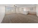 Large loft space with plush carpet and multiple windows at 3167 Biccari Ave, Henderson, NV 89044