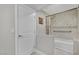Bathroom features a shower-over-tub combo with tile surround and a white door at 3221 Montecito Dr, Las Vegas, NV 89120