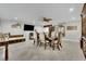 Dining room features ornate wood table, upholstered chairs, and a ceiling fan at 3221 Montecito Dr, Las Vegas, NV 89120