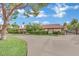 Charming home featuring mature trees and a spacious circular driveway at 3221 Montecito Dr, Las Vegas, NV 89120