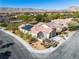 Attractive single-story home featuring solar panels, tile roof, landscaping, and a two-car garage at 3685 Australian Cloud Dr, Las Vegas, NV 89135