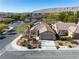 Charming single-story home with a tile roof, attached garage, and a well-manicured front yard at 3685 Australian Cloud Dr, Las Vegas, NV 89135