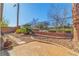 Backyard featuring a concrete patio, stepping stones, and metal fence at 3685 Australian Cloud Dr, Las Vegas, NV 89135