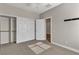 Bedroom with carpet, a closet with sliding doors and an ensuite bathroom at 3685 Australian Cloud Dr, Las Vegas, NV 89135