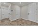 Inviting foyer boasting tile flooring, neutral paint, and two hallway closets at 3685 Australian Cloud Dr, Las Vegas, NV 89135