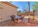 Outdoor patio featuring seating and desert landscaping with a beautiful view at 3685 Australian Cloud Dr, Las Vegas, NV 89135