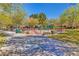 Safe and fun playground with swings, slides, and climbing structures in a fenced-in area for  at 3685 Australian Cloud Dr, Las Vegas, NV 89135