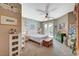 Cozy bedroom with a sliding glass door to the backyard, and a ceiling fan at 3717 Rocklin Peak Ave, North Las Vegas, NV 89081