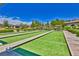 Enjoy a game of bocce ball on this well-maintained court surrounded by landscaping and shaded benches at 3717 Rocklin Peak Ave, North Las Vegas, NV 89081
