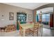 Charming dining room with decorative furnishings and plenty of space for entertaining at 3717 Rocklin Peak Ave, North Las Vegas, NV 89081