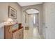 Home entryway featuring tile floors, an arched entryway and decorative furnishings at 3717 Rocklin Peak Ave, North Las Vegas, NV 89081
